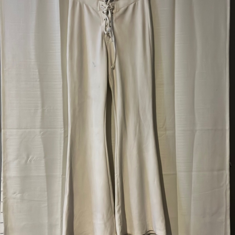 Fashion Nova- White, strap lined, flared, with very stretchy cotton pants.